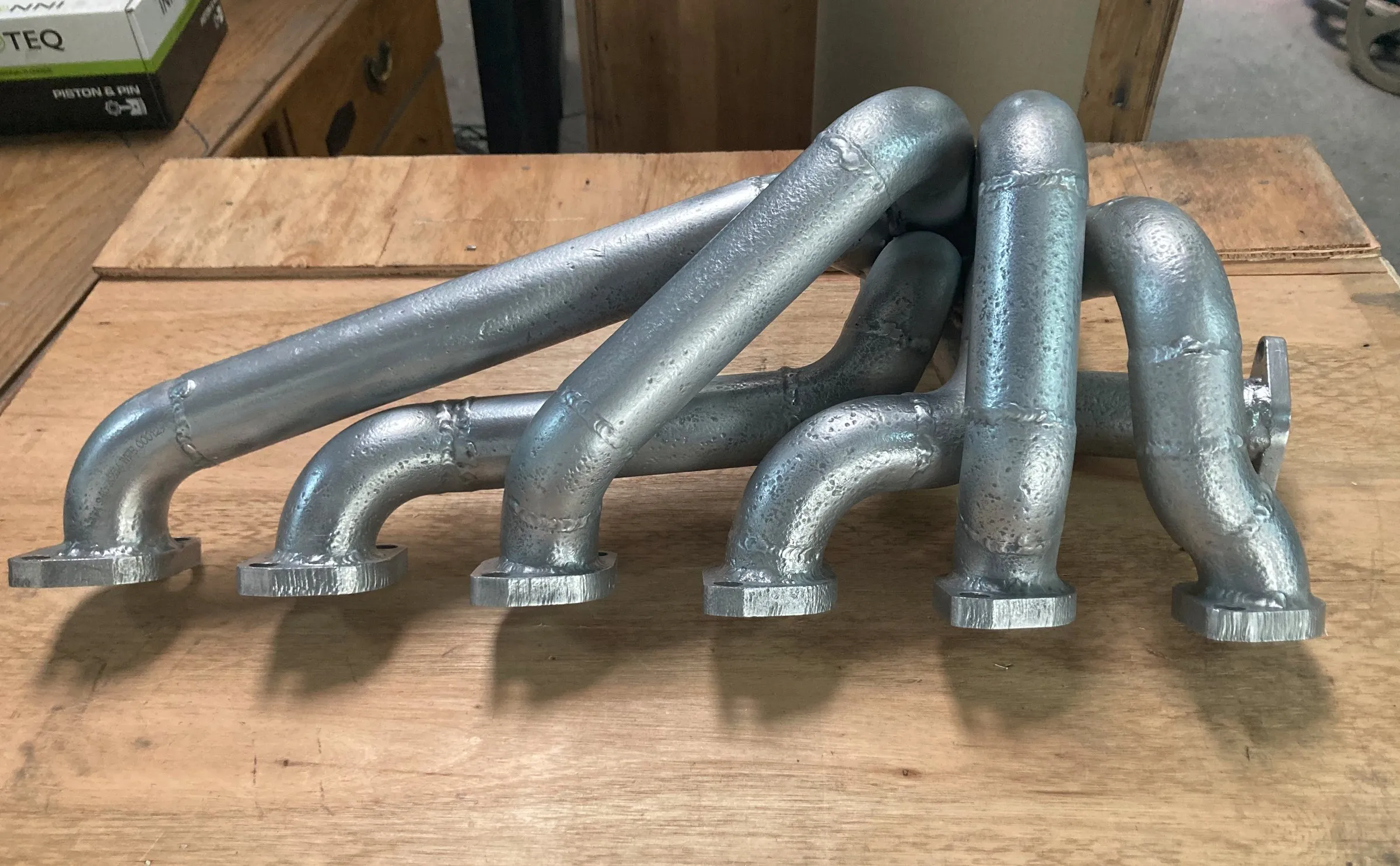 A ceramic-coated BMW six-branch exhaust header
