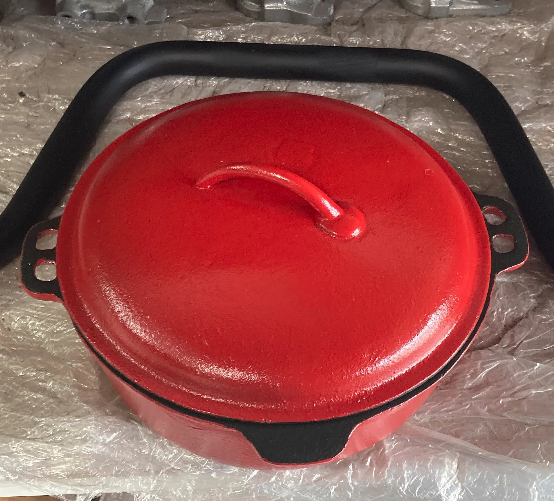 A ceramic-coated cast iron pot