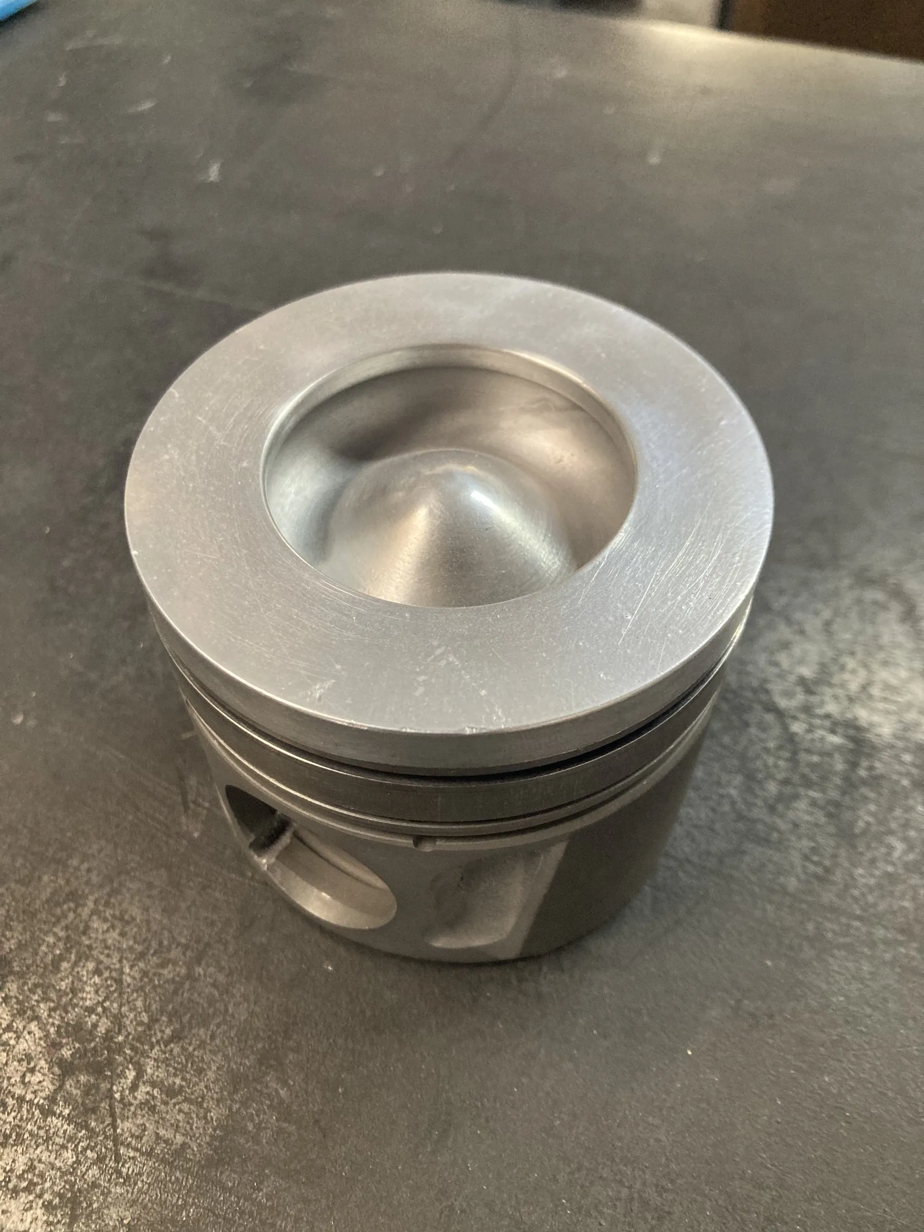 A bare-metal diesel piston