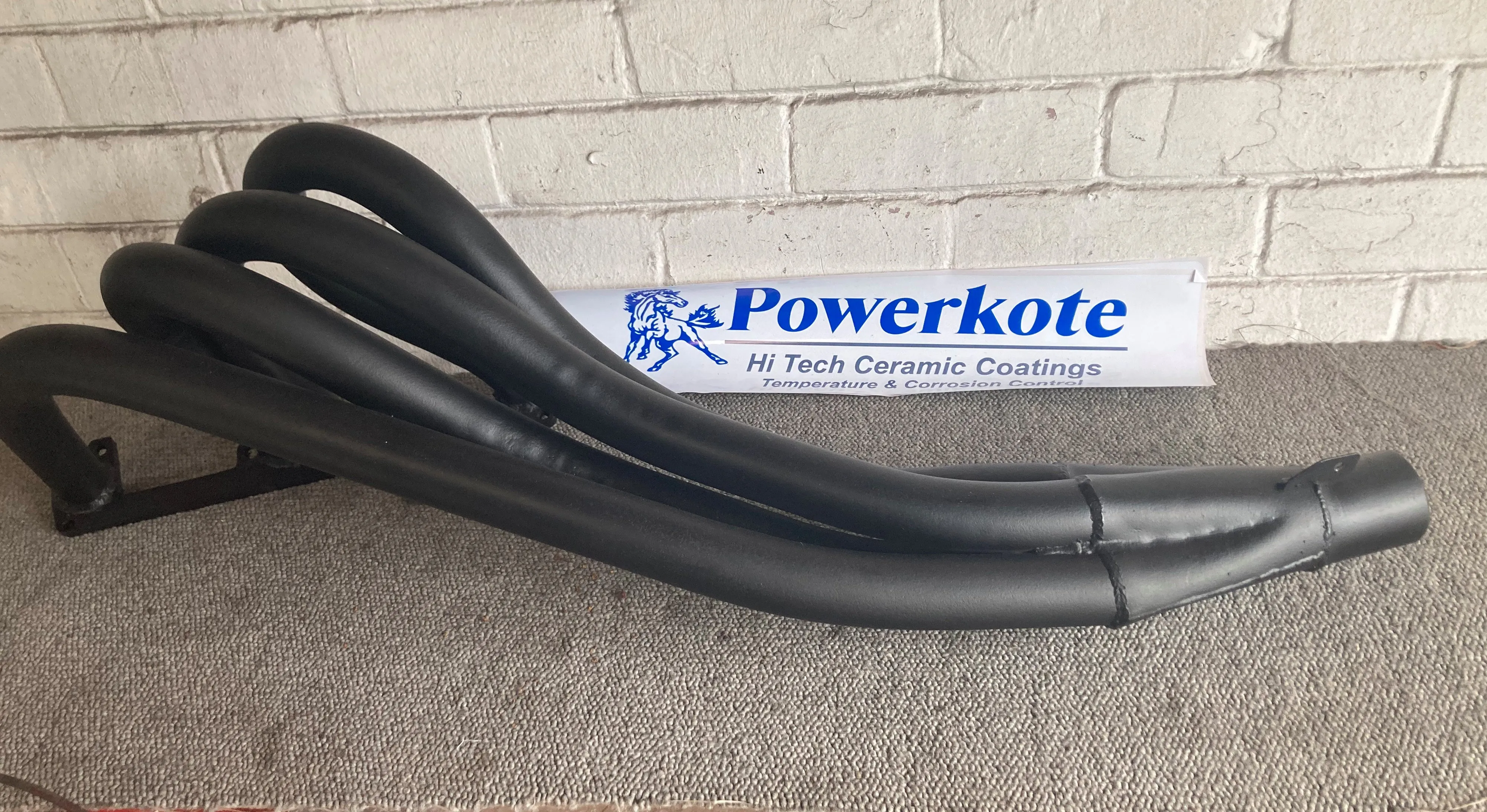 A ceramic-coated motorcycle exhaust header
