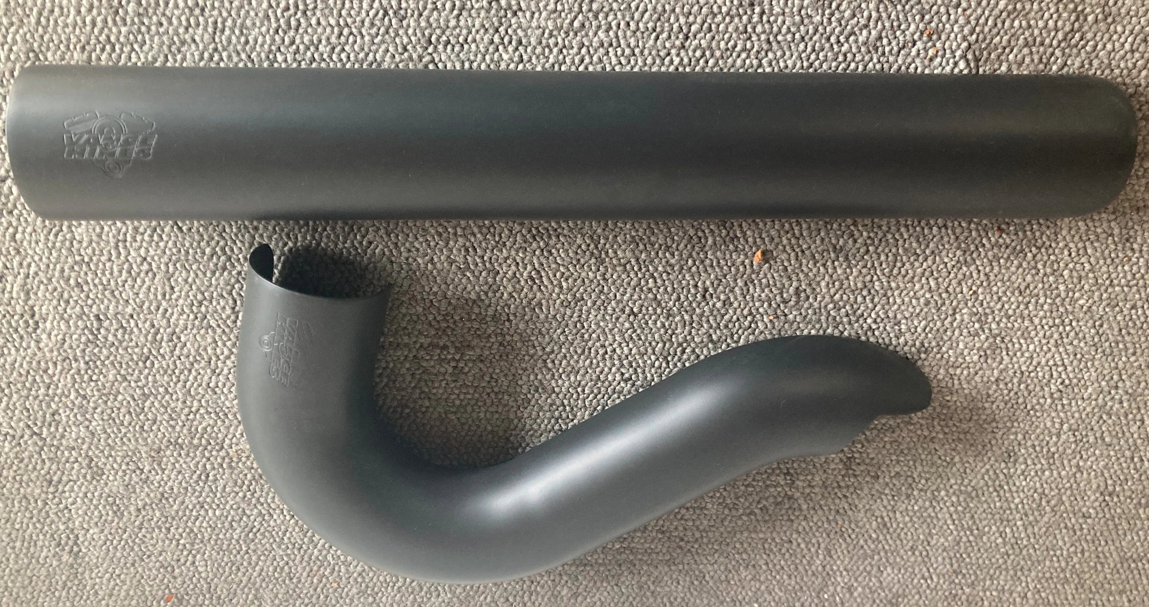 A pair of ceramic-coated motorcycle exhaust heat shields