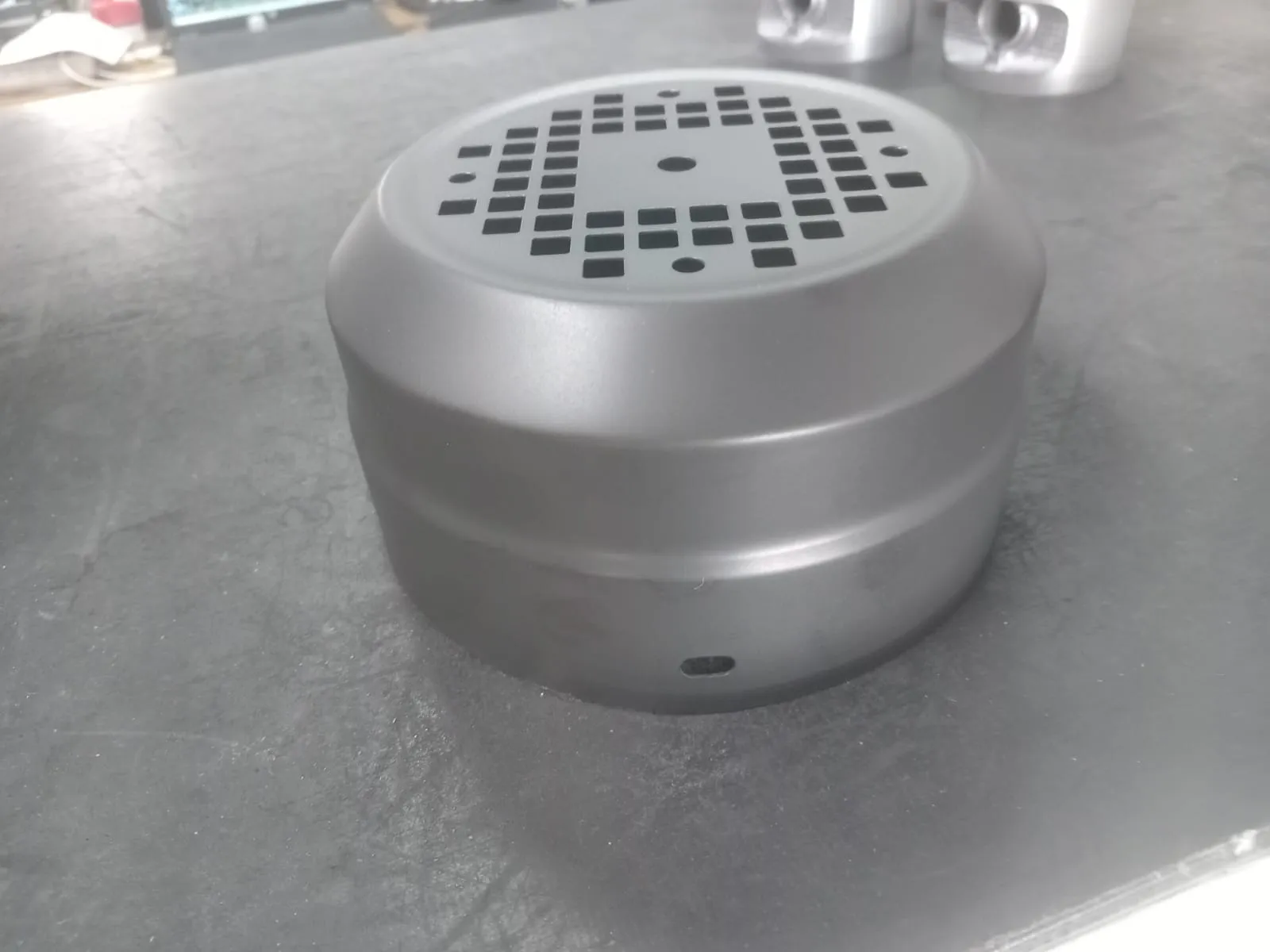 A ceramic-coated electric motor fan cowl